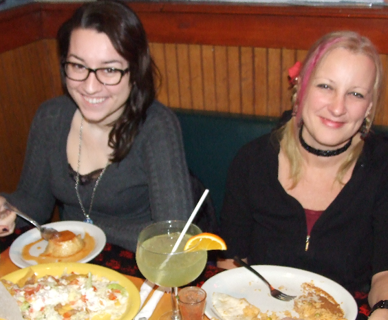 Young ladies having Mexican feast
